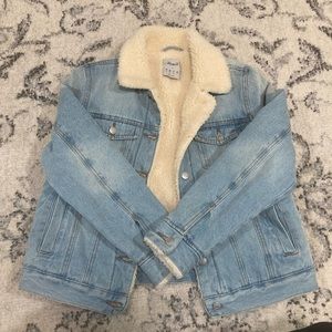 Denim jacket with fur.